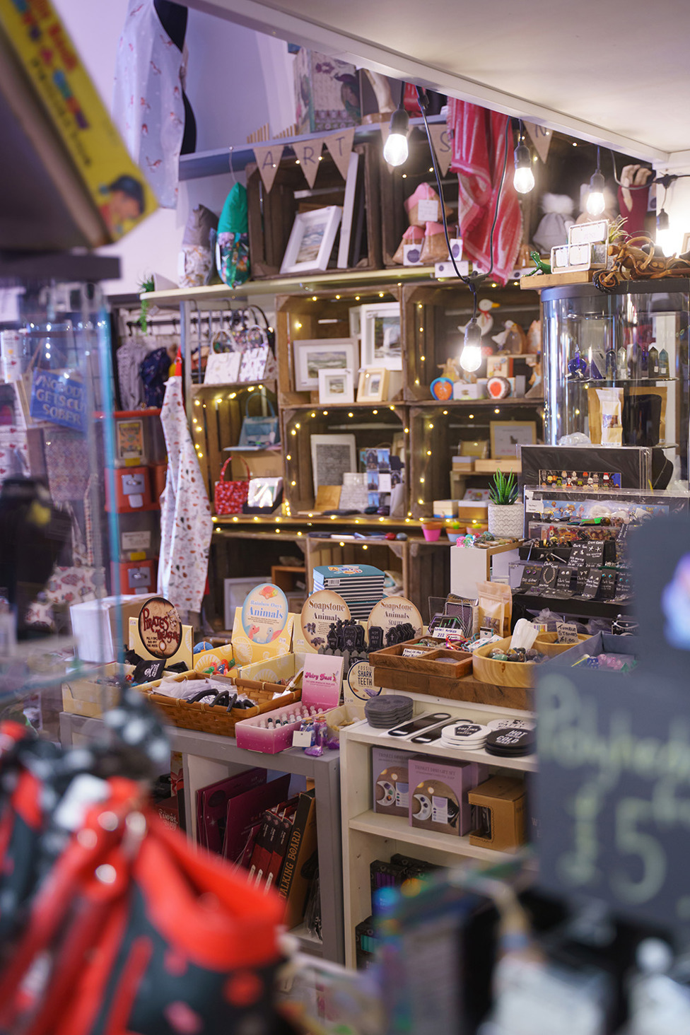 Warm, densely arranged displays inside Townhouse Emporium and My Comic Heroes